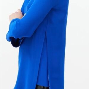 Gucci blue silk blouse crew neckline, flared long sleeves keyhole back size 38